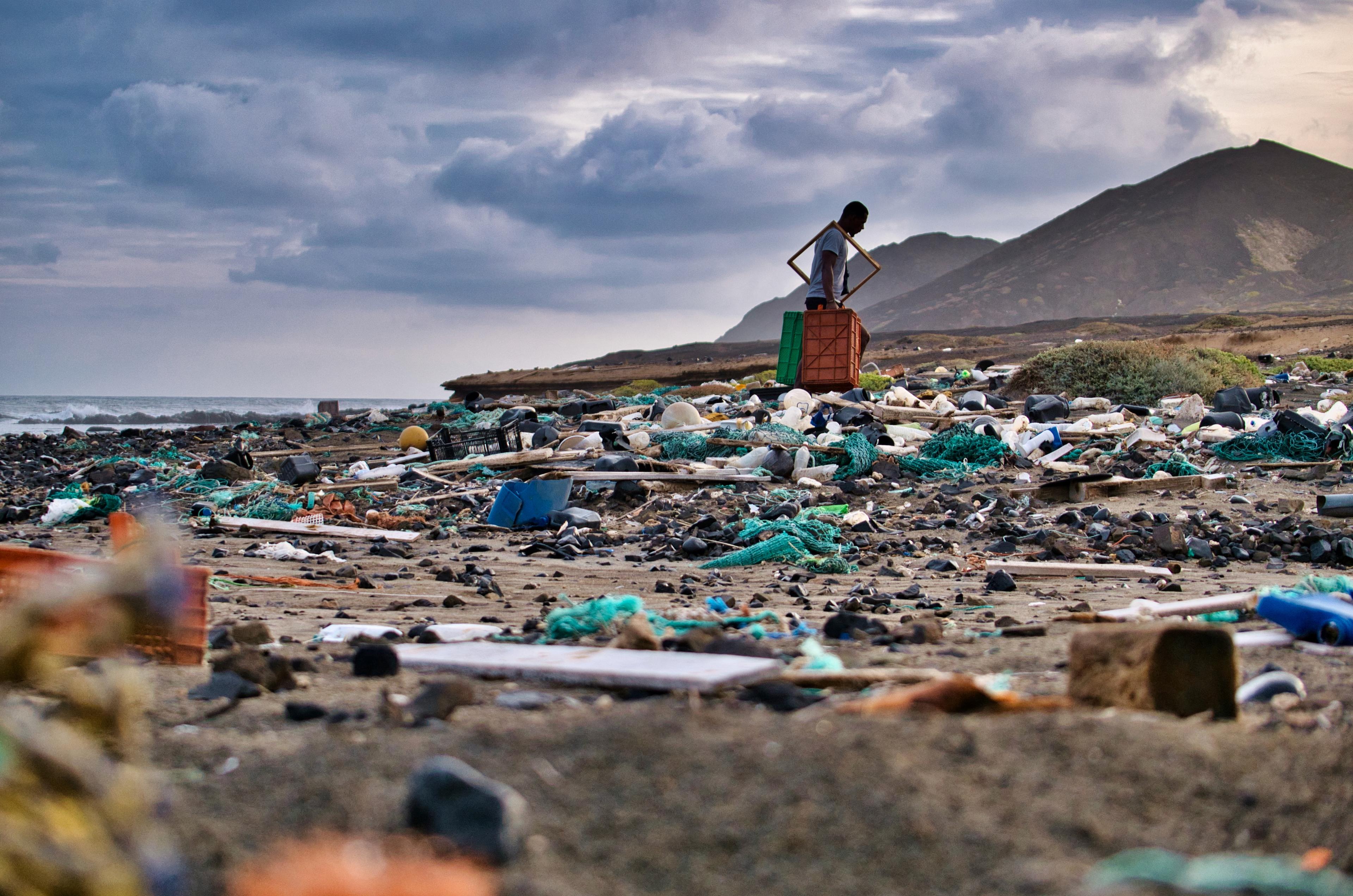 Plastic bottles scattered across a beach in Cape Verde.